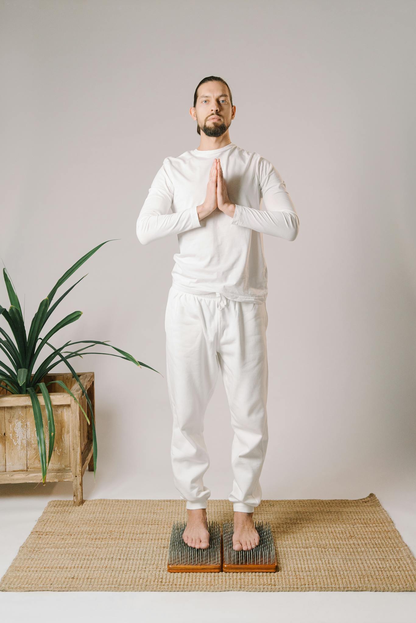 man practicing mindful meditation indoors focusing on